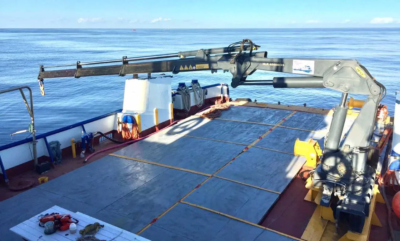 The ship’s crane, platform, and main deck